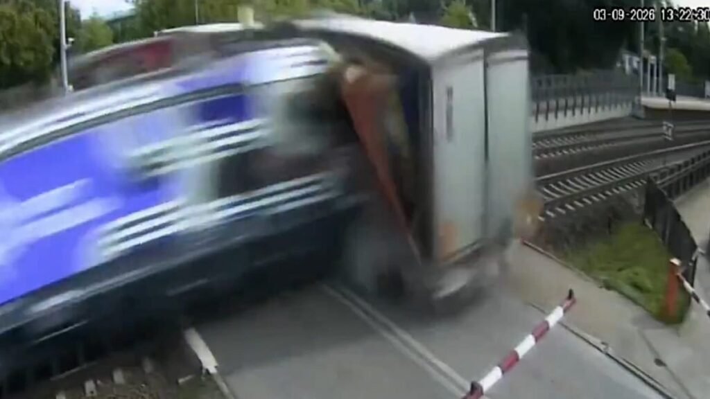 Driver of lorry hit by Polish train refused to break through barriers