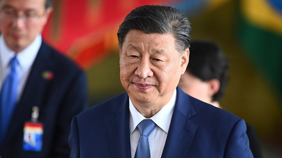 Xi