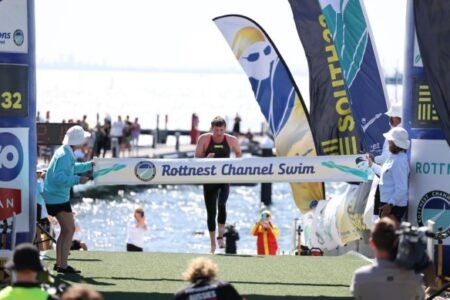 Perth swimmer Max Coten first to reach shore in annual Rottnest swim