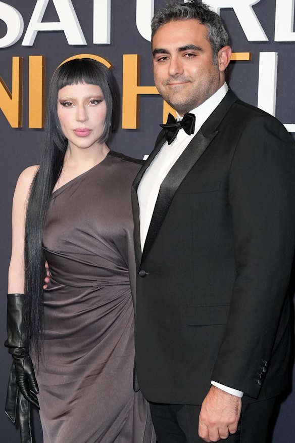With fiancé, Michael Polansky, who had a major role in her new album. She calls him a friend – rare in her life.