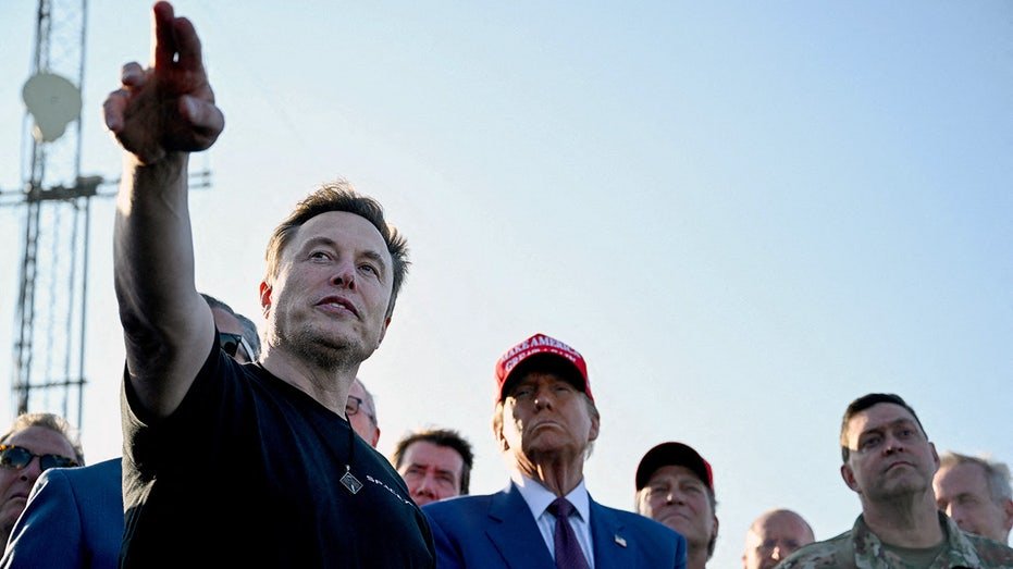 Elon Musk speaks with Donald Trump during SpaceX test launch