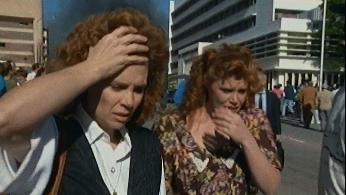 Two women looking distressed after the Oklahoma City bombing.