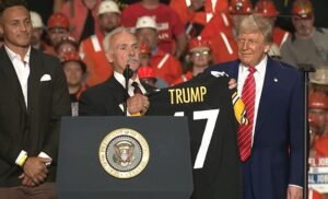 Steelers players join Trump on stage at Pennsylvania event and give him custom jersey