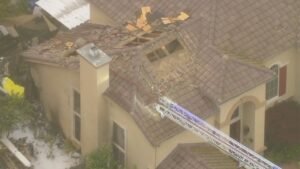 At least 1 dead after small plane crashes into California neighborhood