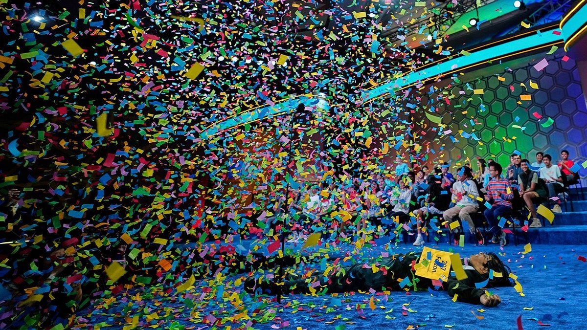 Confetti falls on Scripps National Spelling Bee's 2025 champion Faizan Zaki