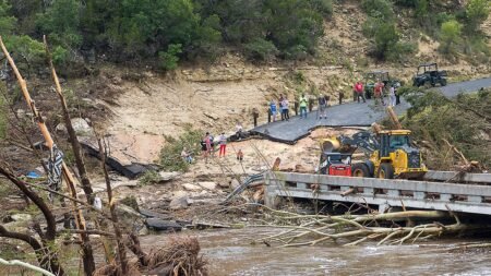 Police say ‘sightseers’ hindering Texas recovery efforts as teams search for victims in debris
