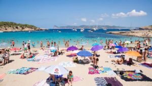Summer beach battle between locals and visitors heats up as overtourism soars