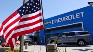 GM profit shrinks despite stronger sales