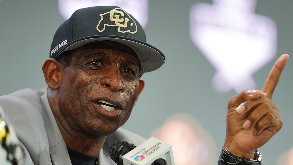 Deion Sanders at a press conference