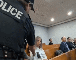 Ontario city facing 2nd legal challenge over arrest of women holding signs in meeting