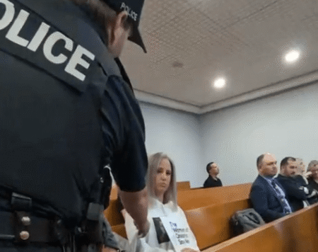 Ontario city facing 2nd legal challenge over arrest of women holding signs in meeting