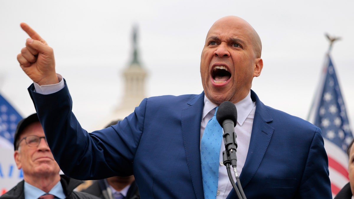 Cory Booker screaming in closeup shot