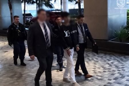 Barangaroo home raided, luxury cars seized in alleged multimillion-dollar scam