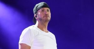 Luke Bryan Reacts to Having Ball Thrown at His Face: ‘I’d Jump Down There if I Could See Them’
