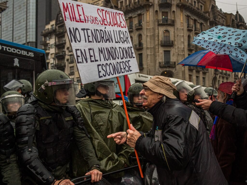 Milei tames inflation, but Argentines still struggle to afford basics