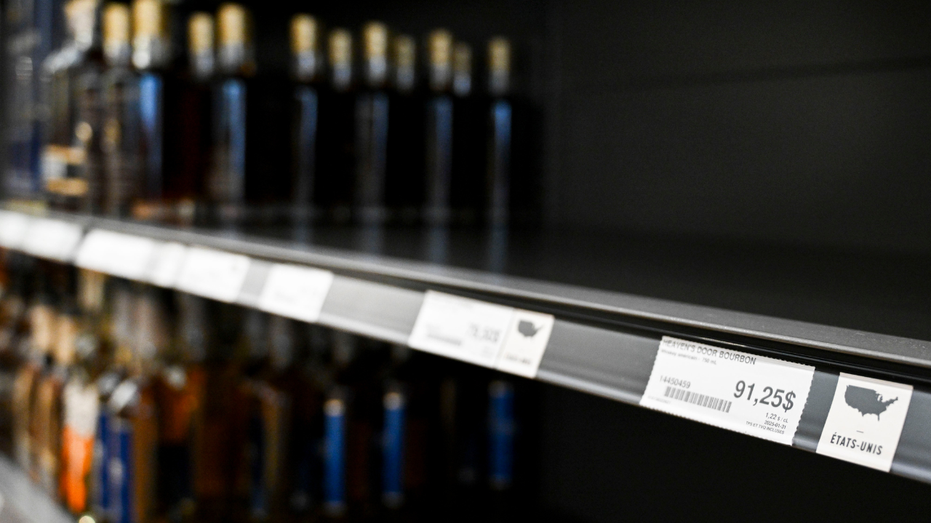 Empty Canadian liquor shelves where American whiskey use to be