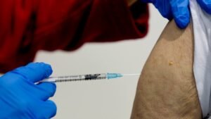 Queensland vaccination rates lowest in nation as double hit of Brisbane Ekka and flu peak near