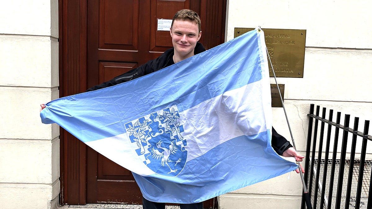 Daniel Jackson, with the flag of Verdis. Meet the man who has declared himself president of his own country