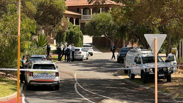 Police at the scene in Mosman Park on Friday morning.