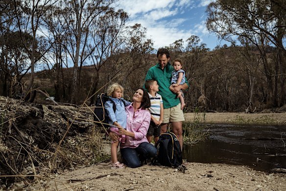 Annabelle and Dave Cleeland comfort their children, Quinn, Arthur and Sigrid, in the aftermath of the Longwood fire.