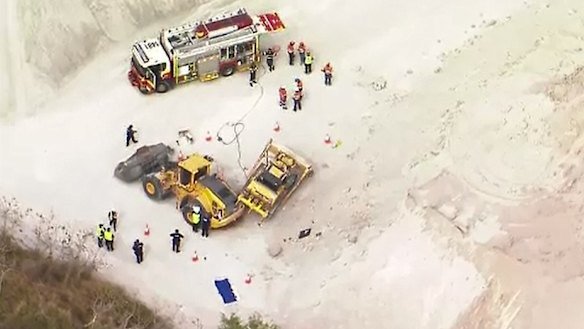 Emergency services attend the workplace fatality.