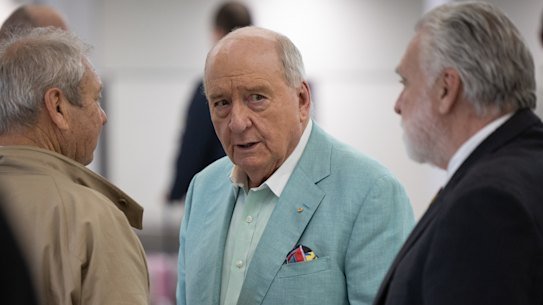 Alan Jones arrives at Sydney domestic terminal on Tuesday.
