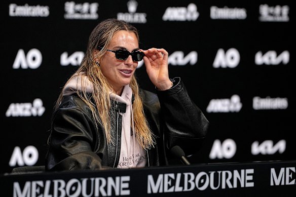 Aryna Sabalenka wearing Gucci sunglasses at the Australian Open after announcing her collaboration with the fashion brand.