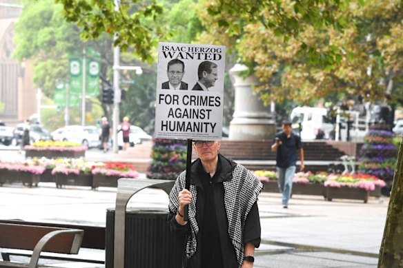 A pro-Palestine protester outside the Supreme Court on Monday.