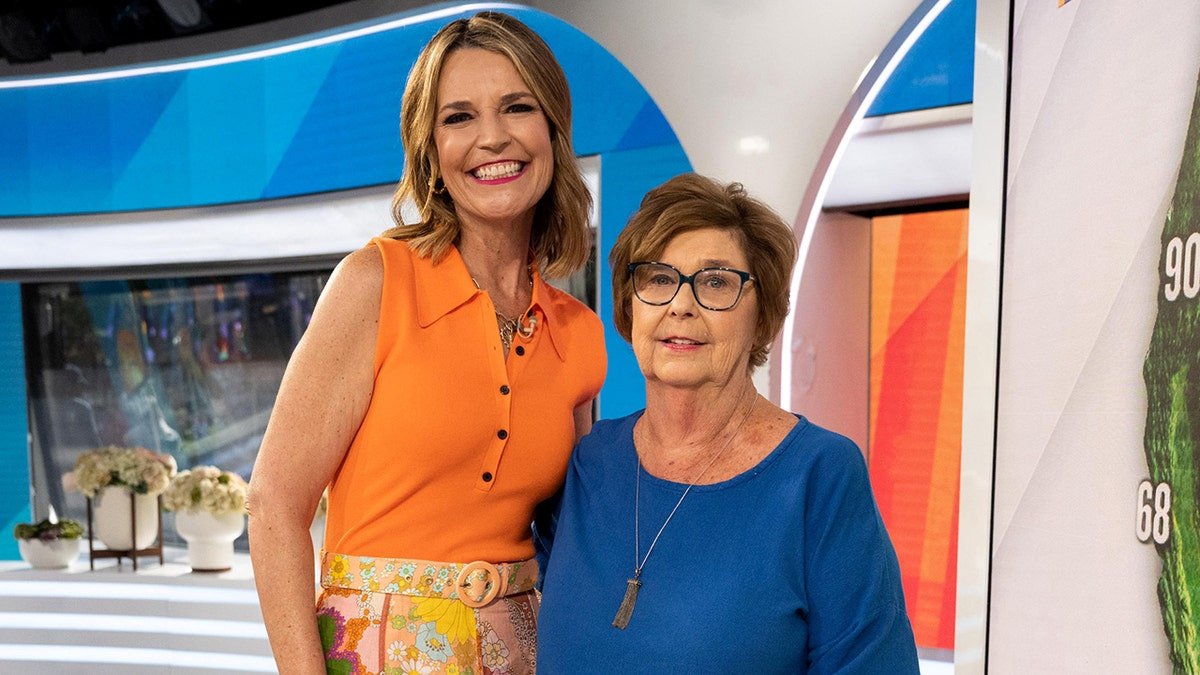 Savannah Guthrie and Nancy Guthrie smiling together on a television set.