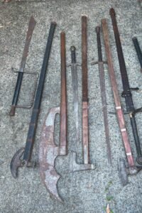 Swords, axes found after alleged threats made to MPs