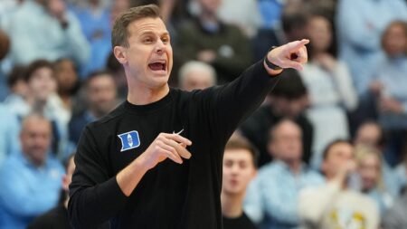 Duke staffers ‘got punched in the face’ as UNC fans stormed court after upset win, coach says