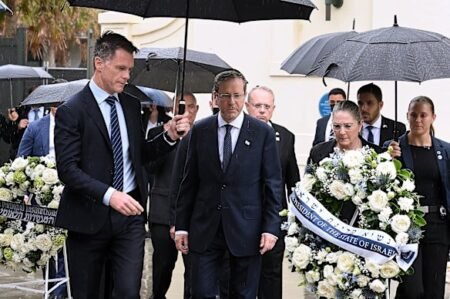 Israeli president says antisemitism a global emergency, lays wreath at Bondi
