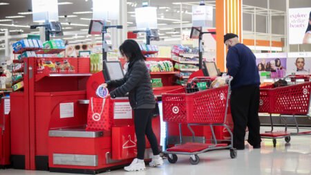 Target cuts 500 jobs, invests more money in store staffing