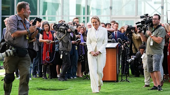 Sussan Ley departs after a media conference where she announced she would resign from parliament in coming weeks.