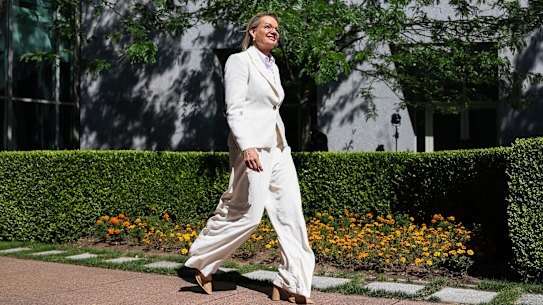 Ley walking through a courtyard at Parliament House on Friday.