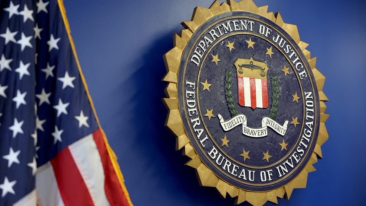 FBI logo next to American flag