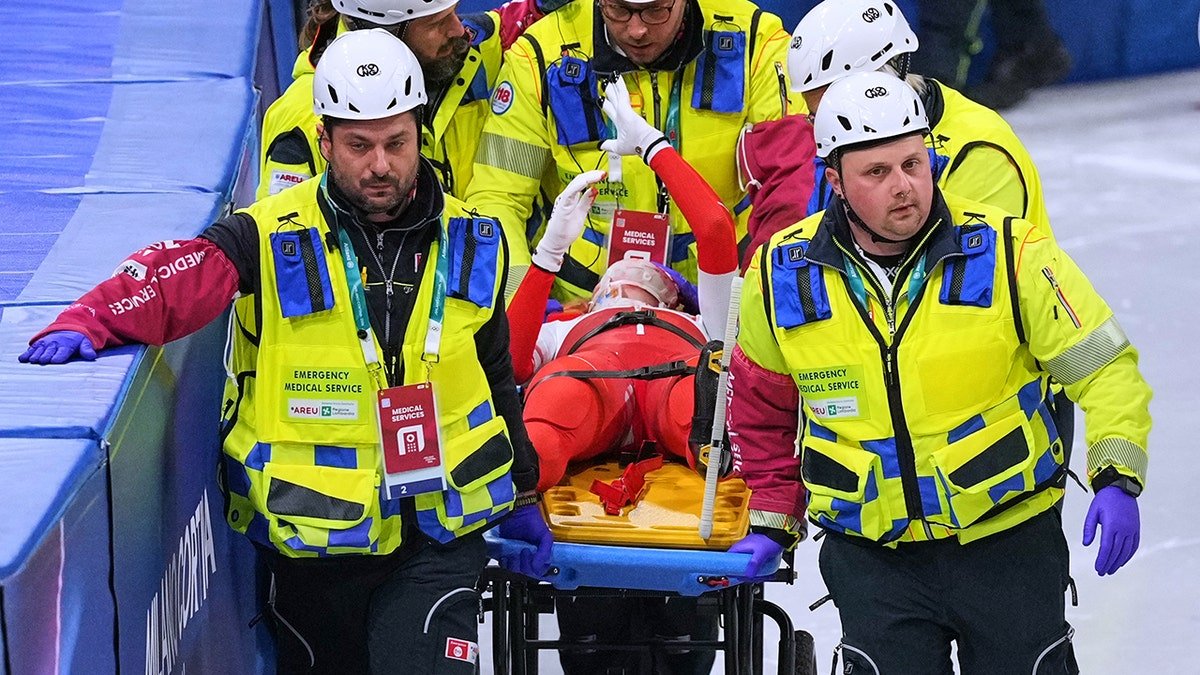 Kamila Sellier stretchered off