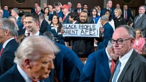 Al Green ejected from Trump primetime address again — this time with protest sign Al Green ejected from Trump primetime address again — this time with protest sign