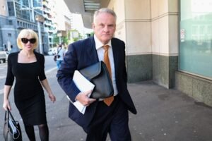 Mark Latham’s lawyer Zali Burrows breaks bread with his ‘enemy’ ATC chairman Tim Hale
