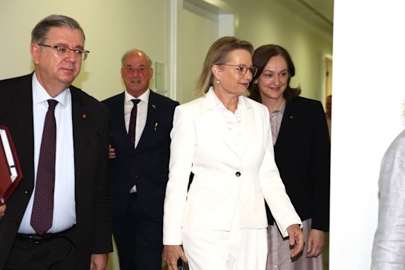 Sussan Ley leaves the party room with supporters after being deposed as Liberal Party leader.