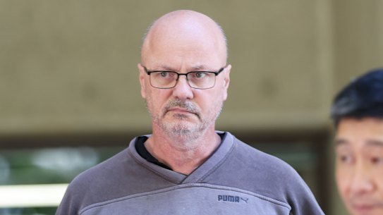 Prominent Sydney barrister, Mark Dennis SC, is released on bail from Surry Hills Police Station.