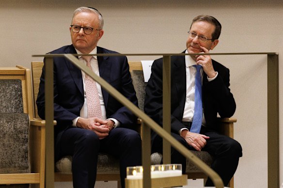 Prime Minister Anthony Albanese and Israeli President Isaac Herzog attend a service for the victims of the Bondi terrorist attack at the Chabad of Bondi.