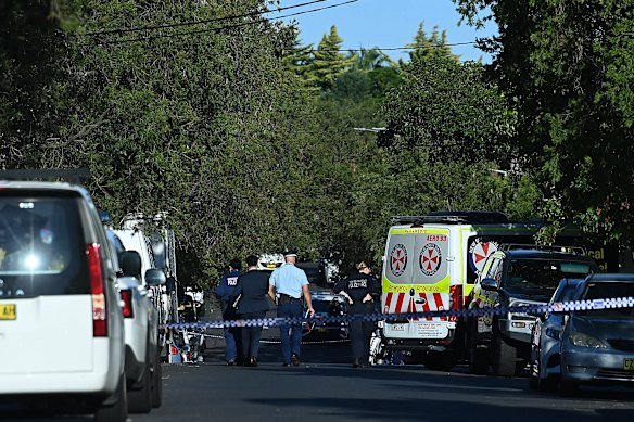 Police and paramedics at the scene where former NRL player Matt Utai was shot on Tuesday. 