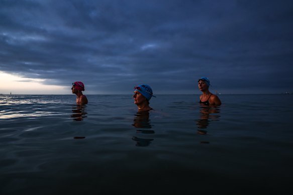 Thomas (centre) and Hingston (right) say there were changed by last year’s  scary training swim.