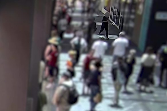 Police released grainy video of the suspect hurling something towards the crowd in Perth on January 26.