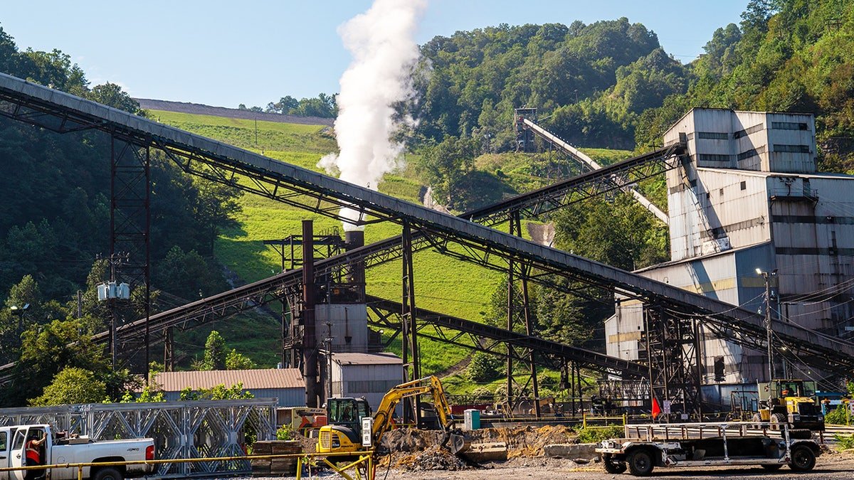 PINEVILLE, WEST VIRGINIA - AUGUST 29: Conveyor belts carry bituminous coal from the Road Fork 52 coal mine owned by Alpha Metallurgical Resources August 29, 2022 in Pineville, West Virginia. In 2020, West Virginia was the second-largest coal producer in the nation, after Wyoming and accounted for 13% of U.S. total production. In the 1950s, the West Virginia coal industry once employed 100,000 workers. In 2022, it employs just 12,000. (Photo by Robert Nickelsberg/Getty Images)