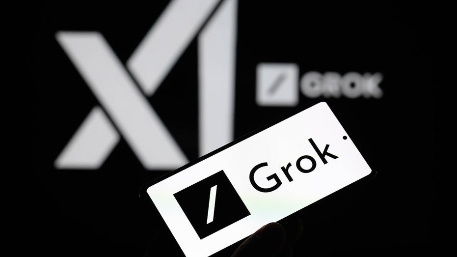Grok logo on a phone screen
