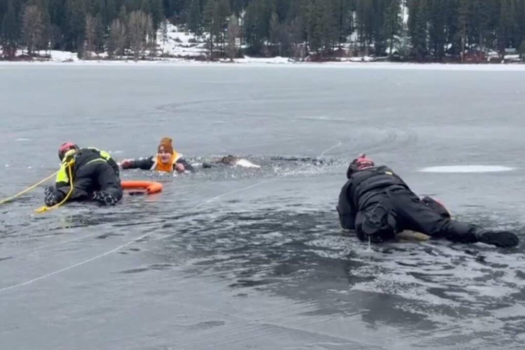 Washington man falls through ice into frigid lake — right in front of cops practicing water rescues