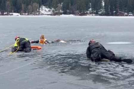 Washington man falls through ice into frigid lake — right in front of cops practicing water rescues