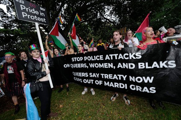 Activist group Pride in Protest carry a banner as 200 floats and thousands of people take part in Sydney’s Mardi Gras parade on March 2, 2024. 